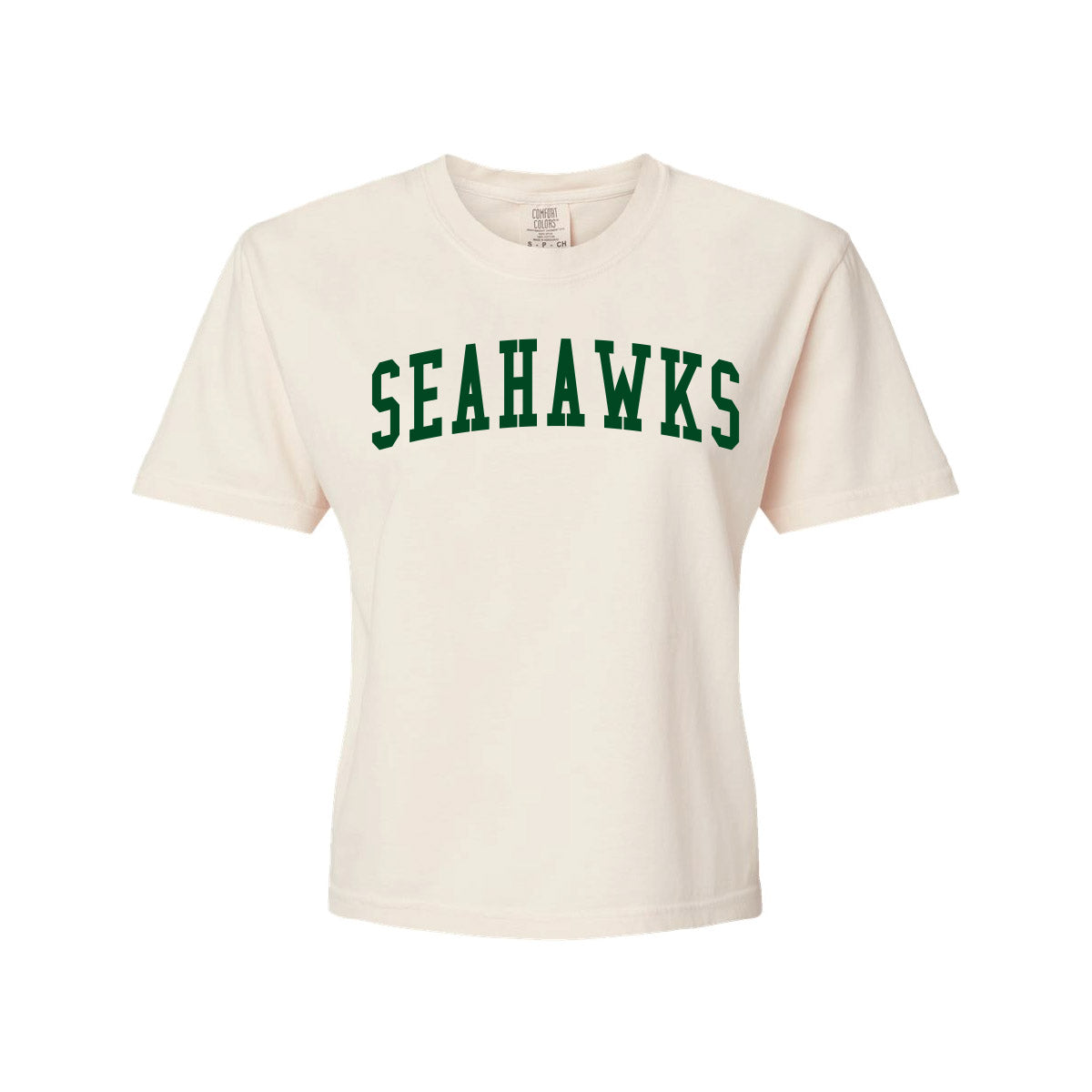 An off-white short-sleeve t-shirt with 'SEAHAWKS' printed across the chest in dark green varsity-style block letters, shown against a plain white background.